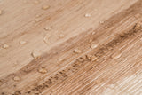 Water droplets on palm leaf dish
